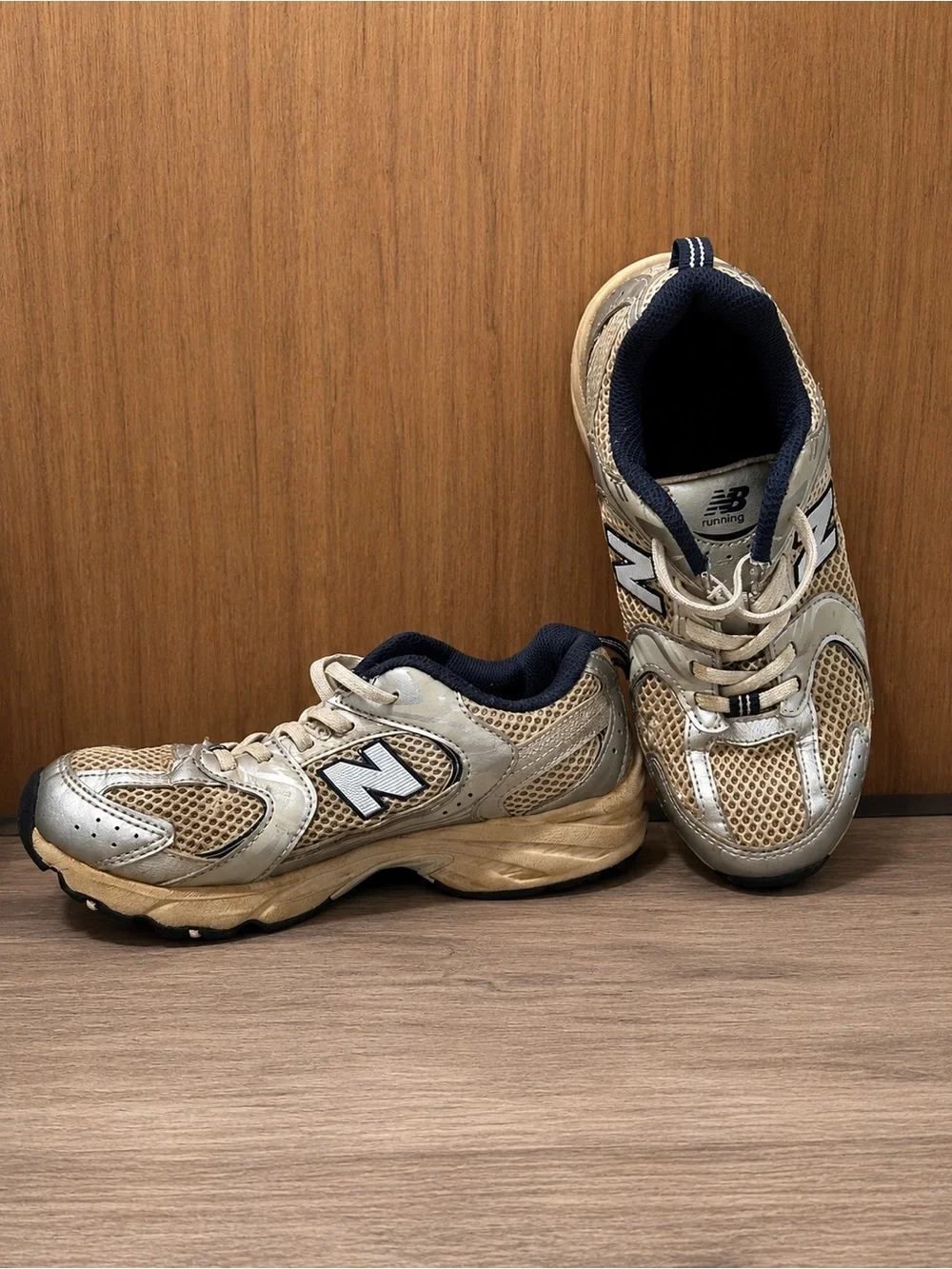 Used good New Balance Kids Beige and Navy 590 Sneaker